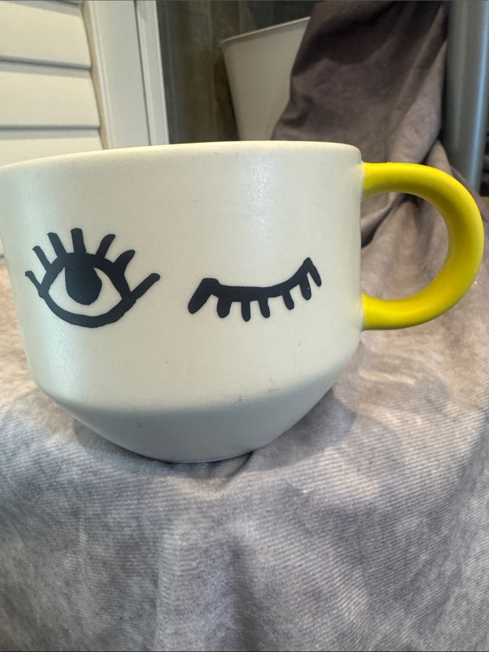 Starbucks Ceramic White Mug with Yellow Handle and Eye Wink Design‎